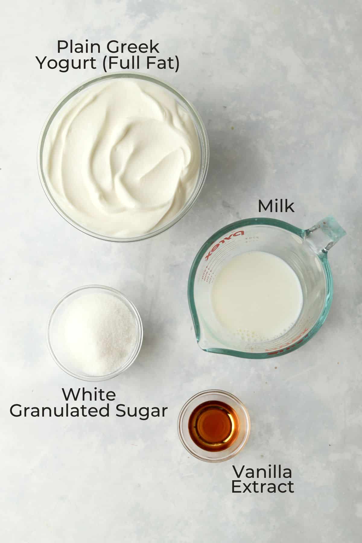 Greek Yogurt, milk, sugar, and vanilla in glass bowls.