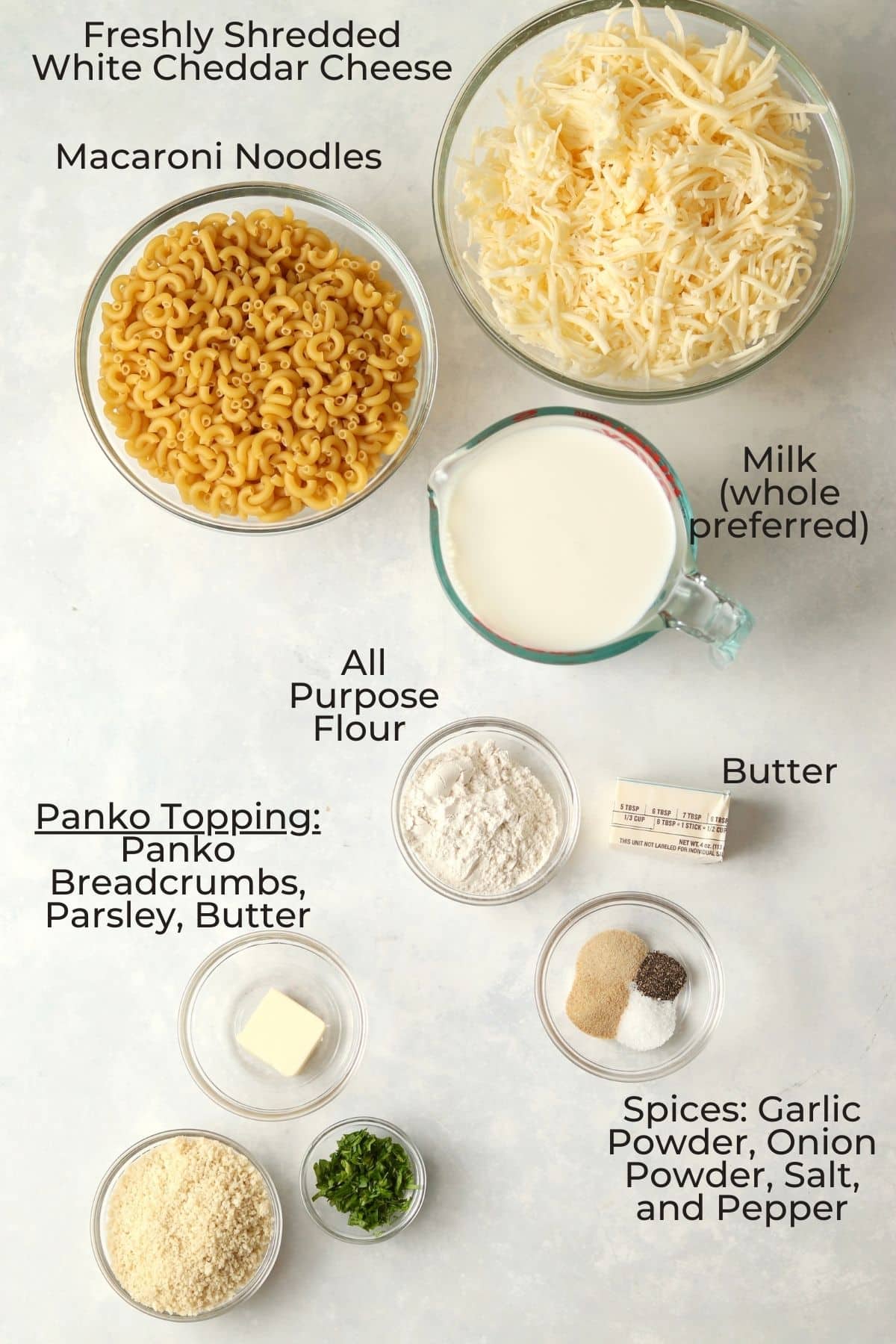 White cheddar Mac and cheese ingredients in bowls.