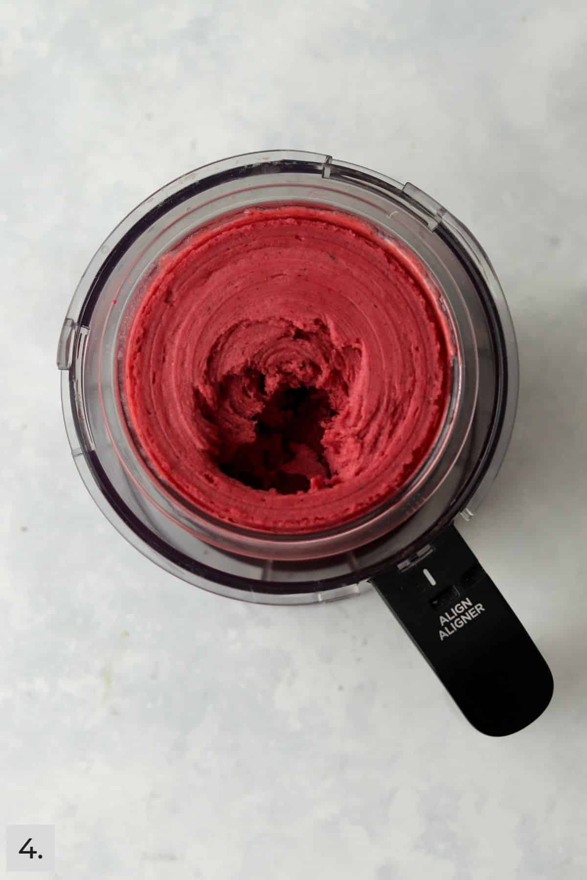 Ninja Creami Mixed Berry Sorbet after two spins and has a creamy texture.