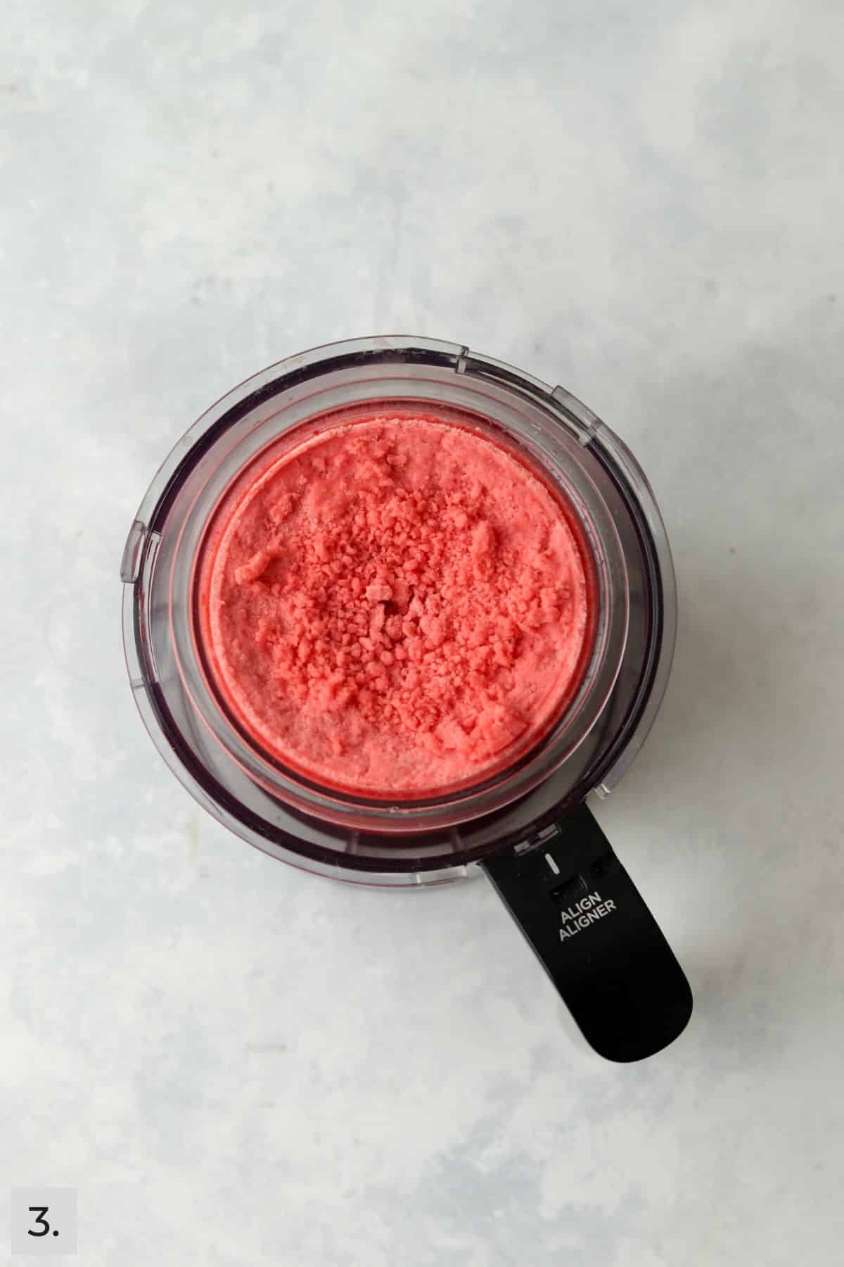 Crumbly blended strawberry sorbet in Ninja Creami.