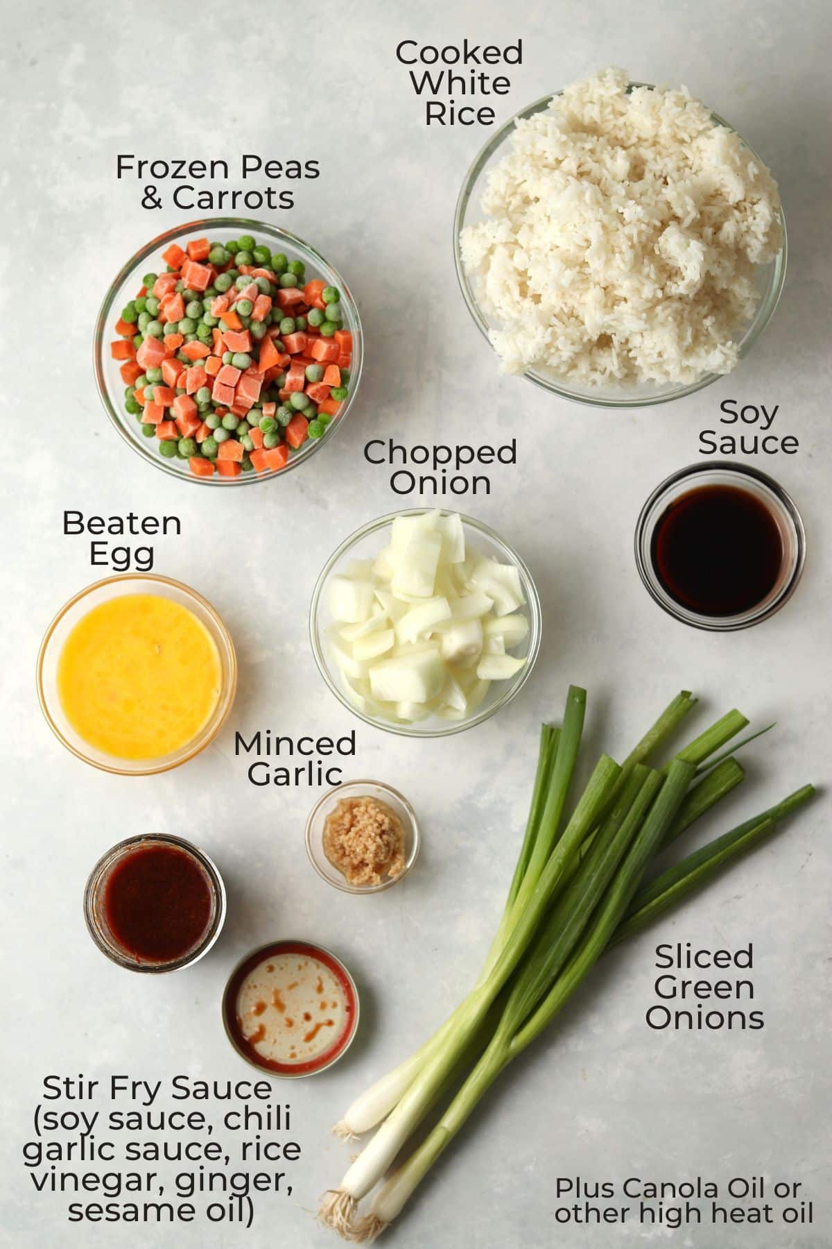 Veggie Fried Rice ingredients in glass prep bowls.