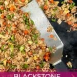 Blackstone Veggie Fried Rice with a metal spatula.