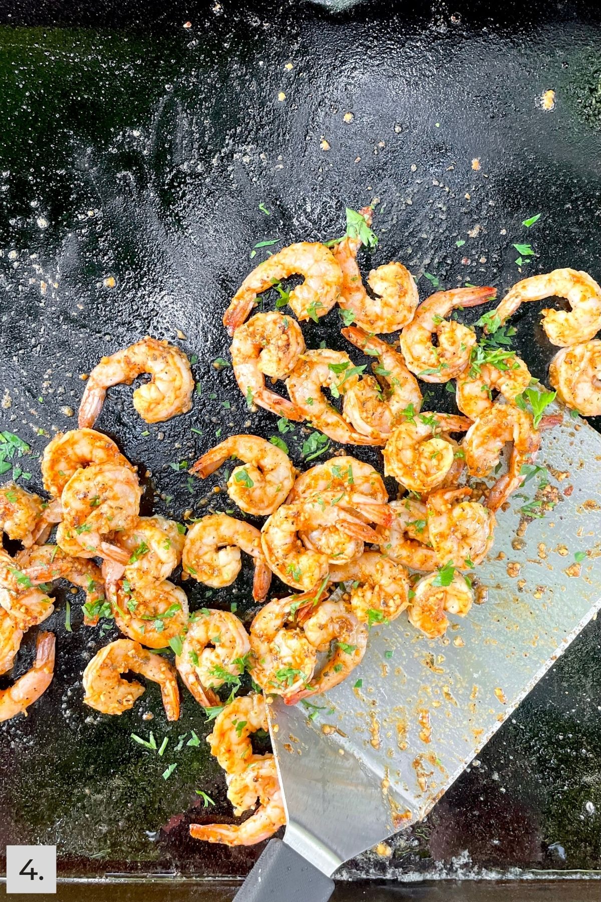 Finished cajun shrimp on Blackstone griddle.