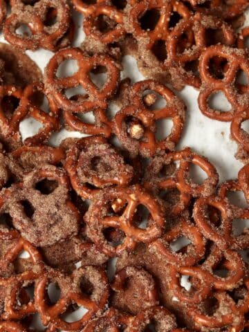 Cinnamon sugar pretzels on the parchment lined baking tray.