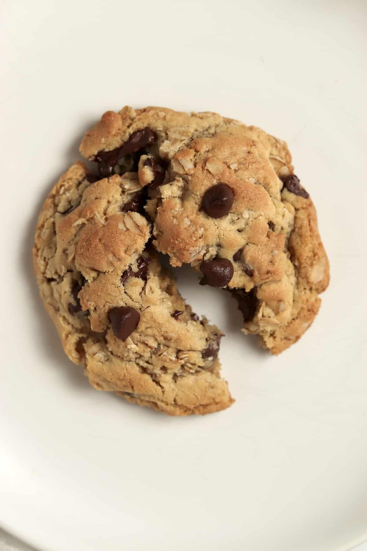 Single serve oatmeal chocolate chip cookie split in half.