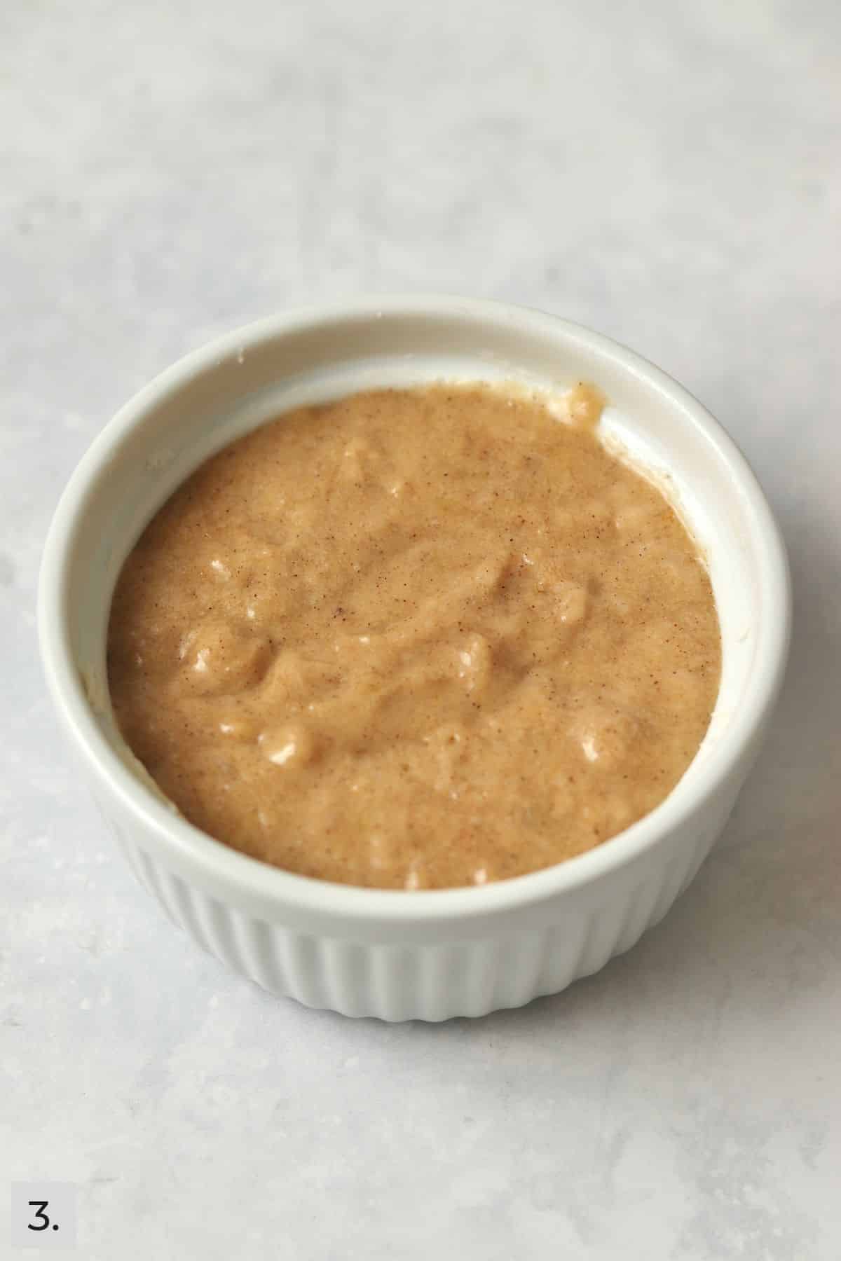 Single serve banana bread in the ramekin before baking.