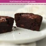 Single serve brownie cute in half to show fudgy inside.