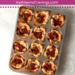 Pizza cups in a muffin pan.