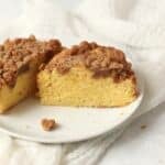 Single serve coffee cake with streusel topping on a small plate.