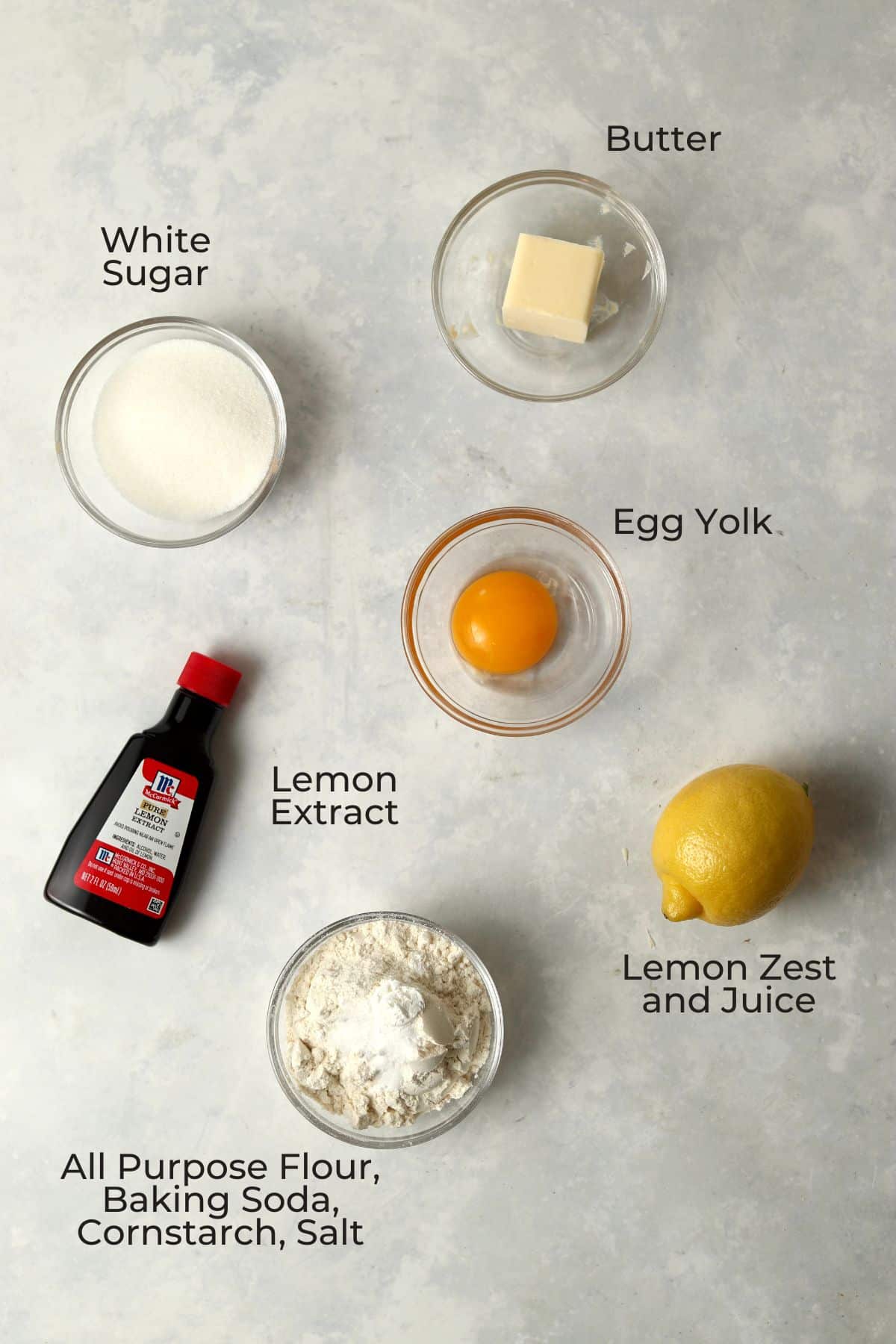 Small batch lemon cookie ingredients in glass prep bowls.
