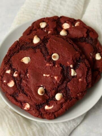 Single serve red velvet cookie on a plate.