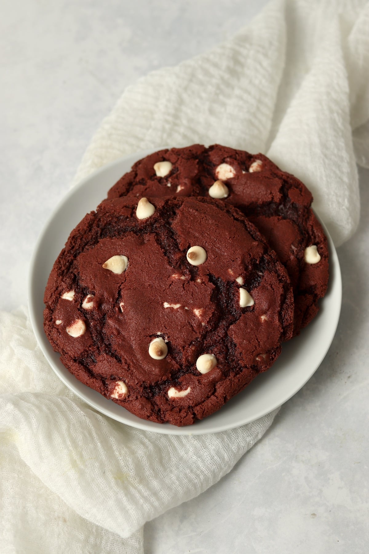 Small batch of red velvet cookies on a plate.