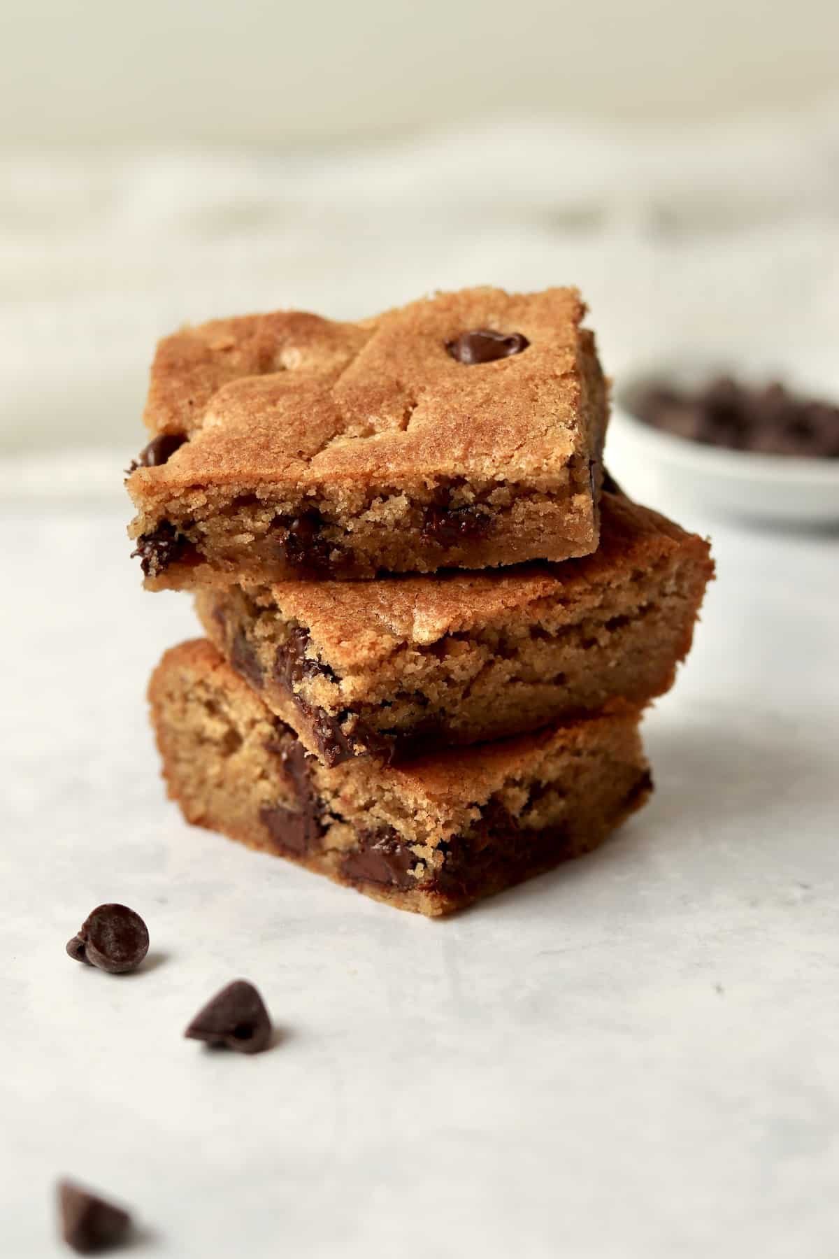 Stack of almond butter chocolate chip cookie bars.