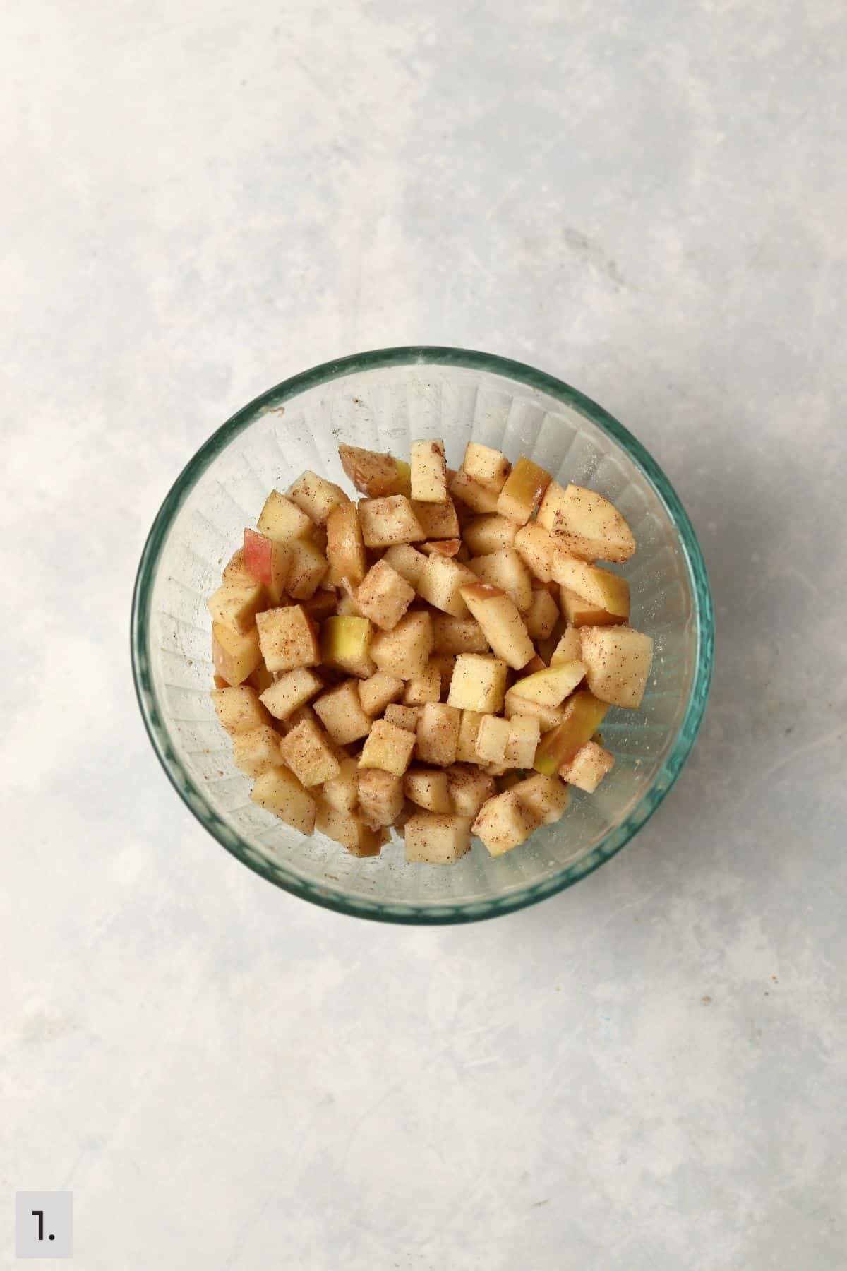 Diced apples tossed with flour, sugar, and cinnamon.