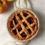 Single serve apple pie in a mini 5 inch pie dish after baking.