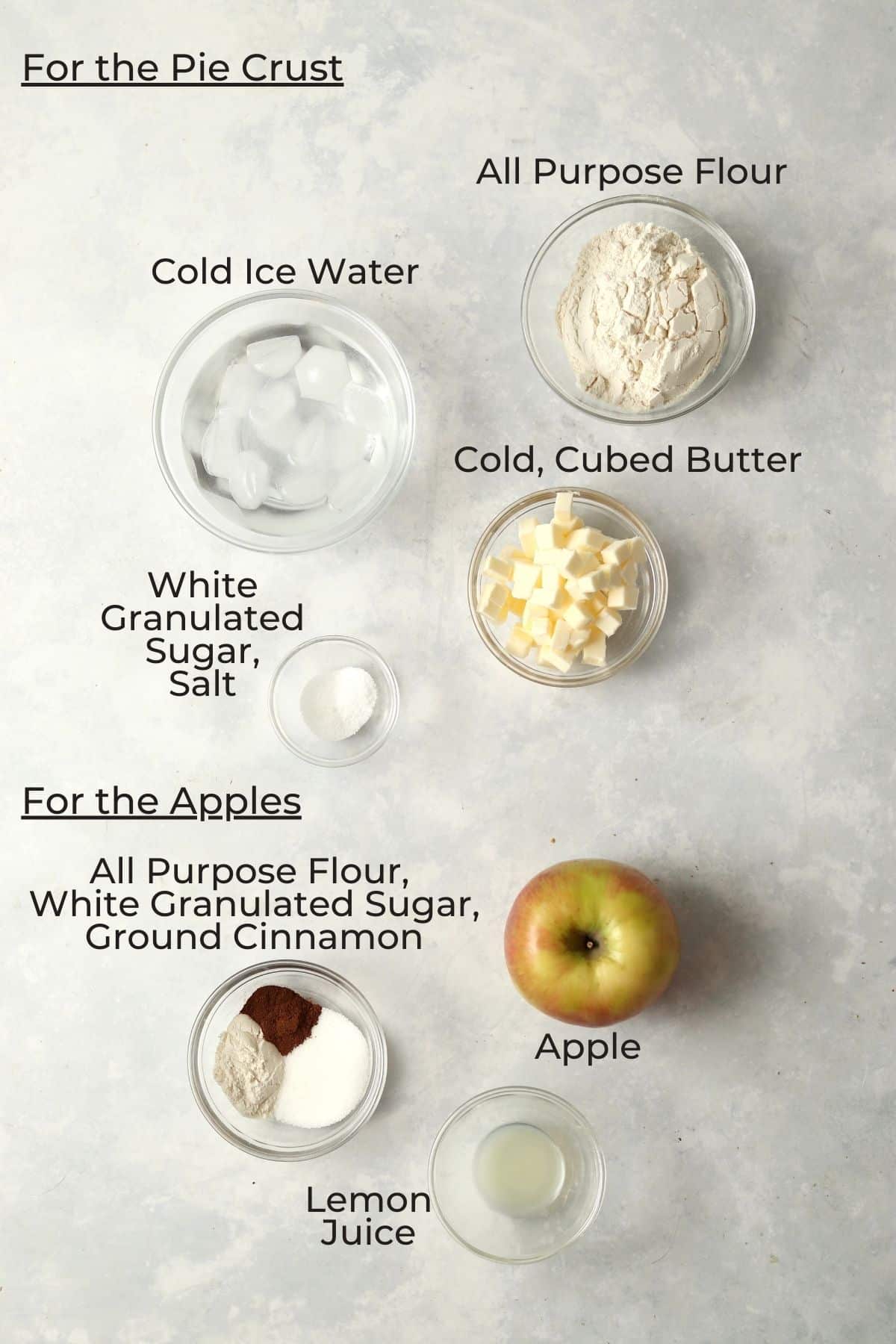 Small batch apple pie ingredients in small glass prep bowls.