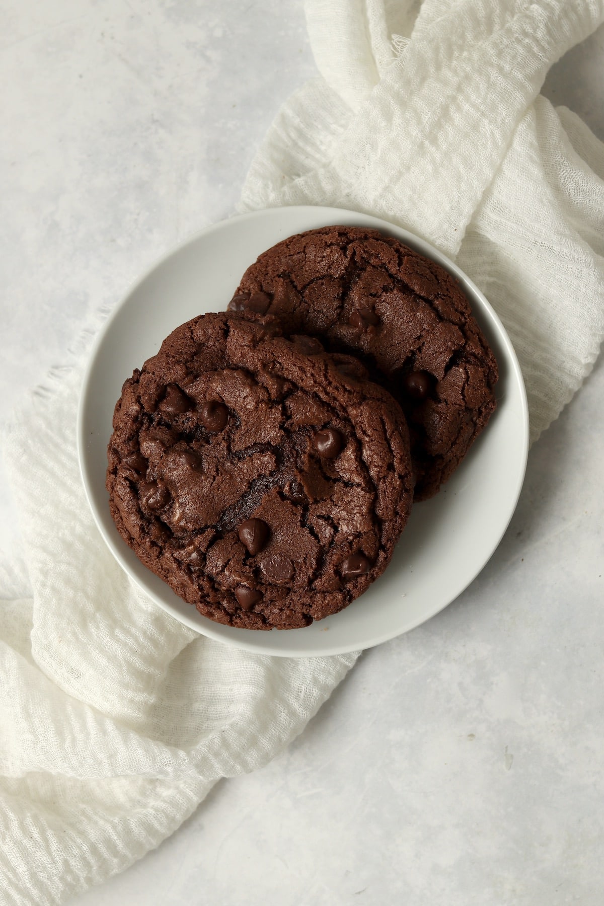 Single serve double chocolate cookies on a small plate.