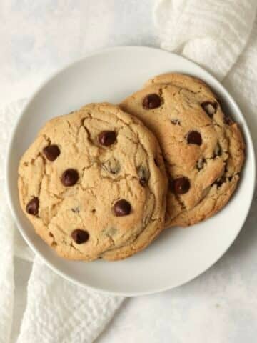 Single serve gluten chocolate chip cookies on a small plate.