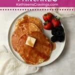 Single serving of pancakes on a plate with maple syrup.