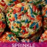 Pile of colorful sprinkle sugar cookies.