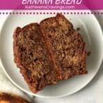 Single Serve Cinnamon Swirl Banana Bread cut in half to show center with a ripe banana.