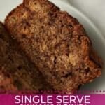 Single Serve Cinnamon Swirl Banana Bread cut in half to show center with a ripe banana.