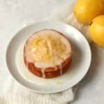 Single serve lemon pound cake with glaze on a small plate.