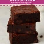 Stack of fudgy chocolate brownies.