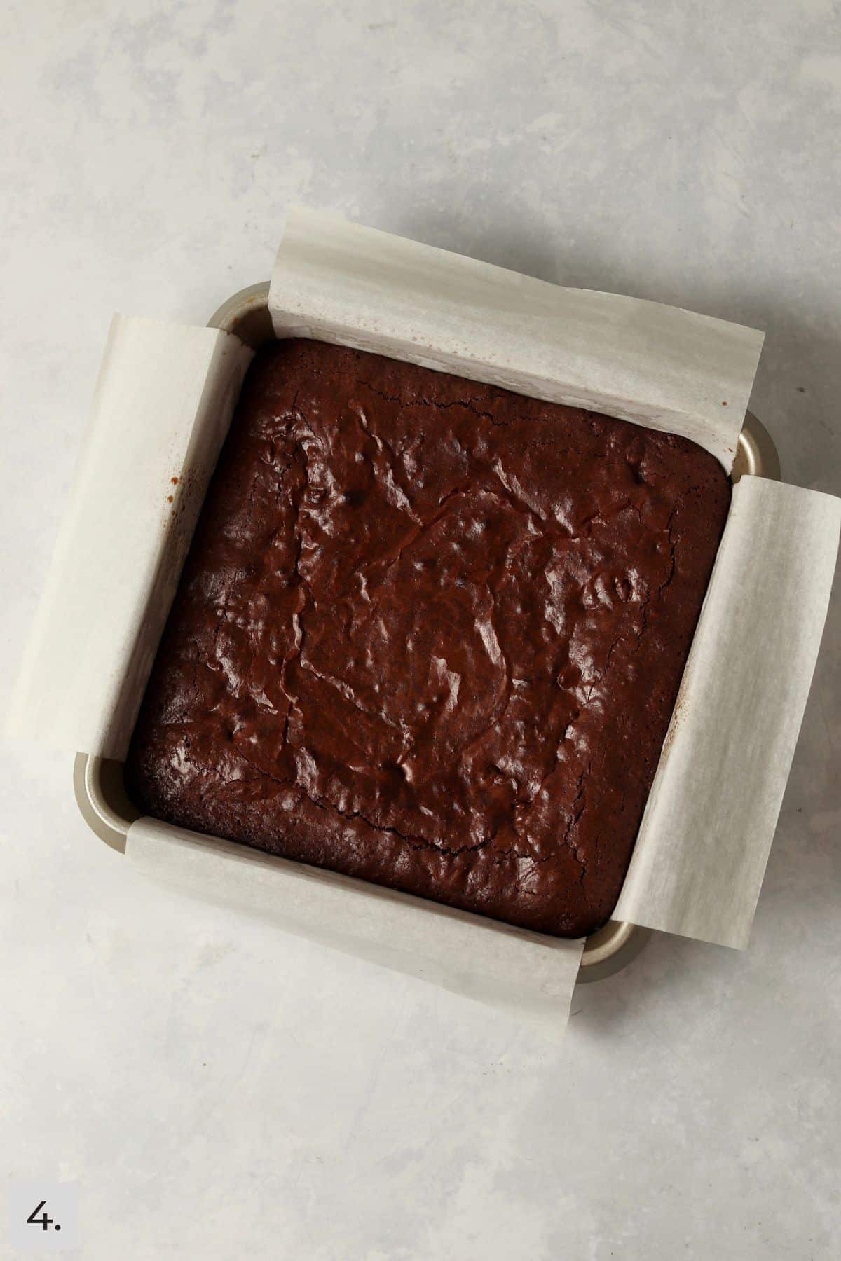 Baked brownies in the pan before cutting.