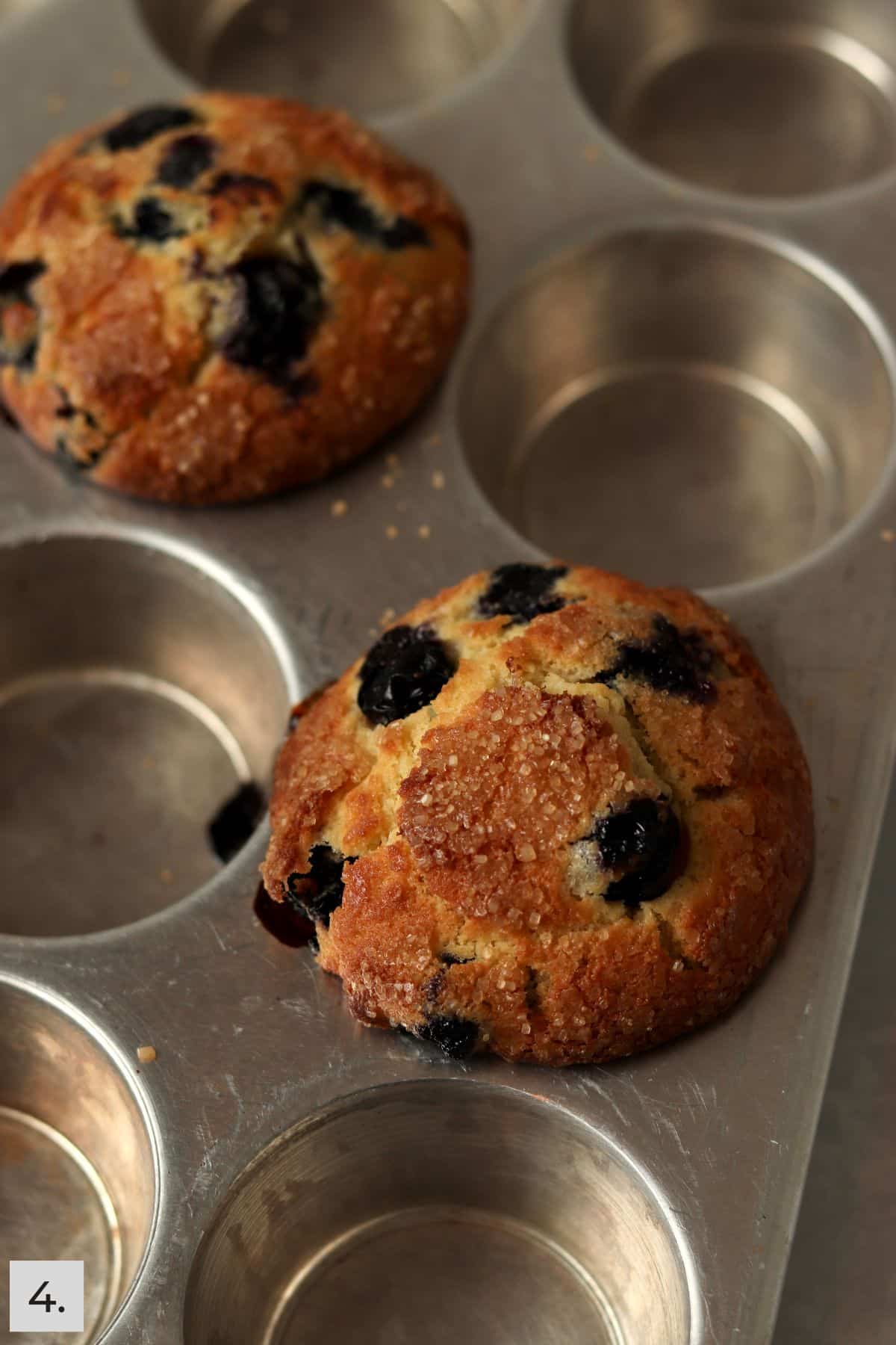 Baked single serve blueberry muffins in the pan.