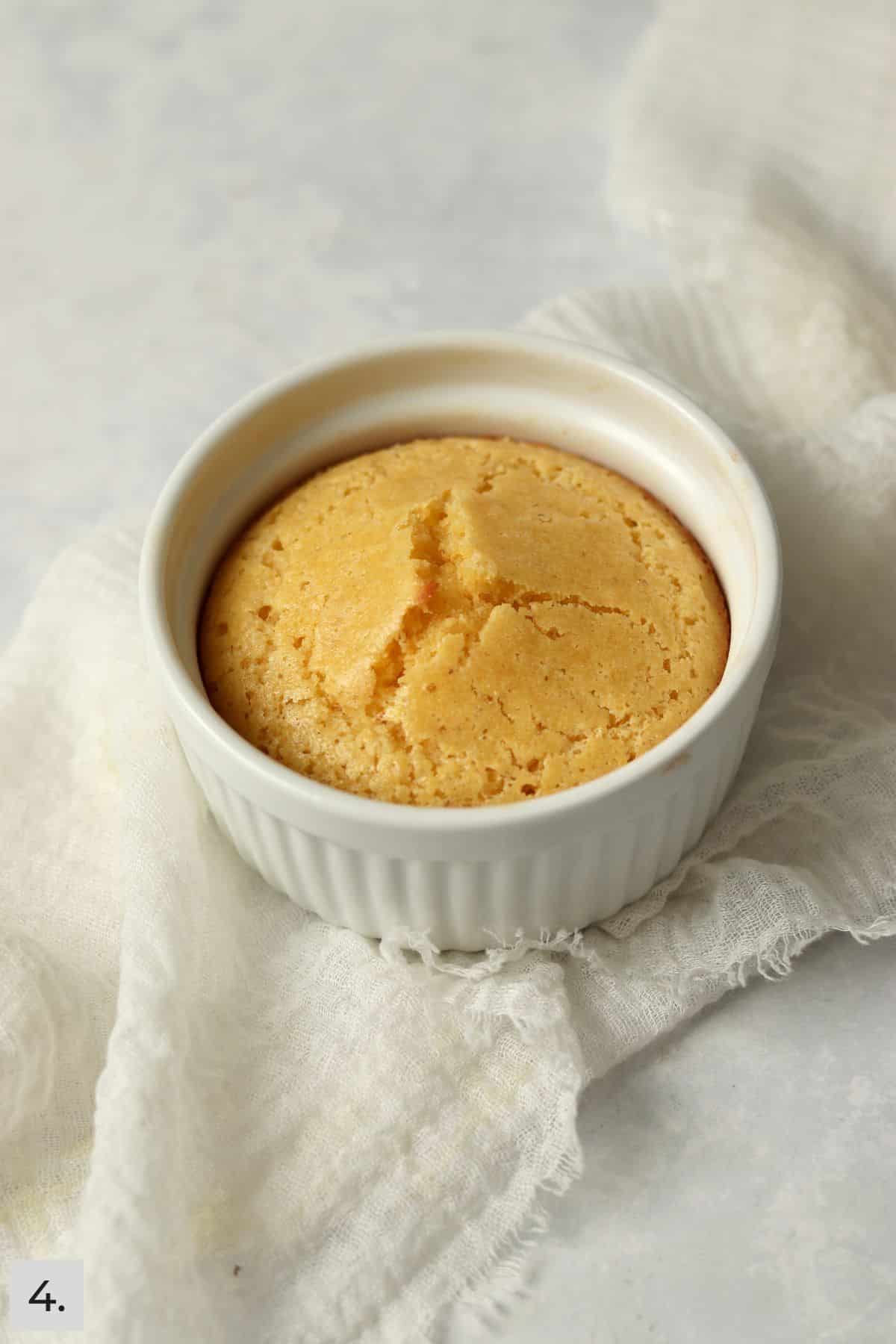Baked cornbread for one in a ramekin.