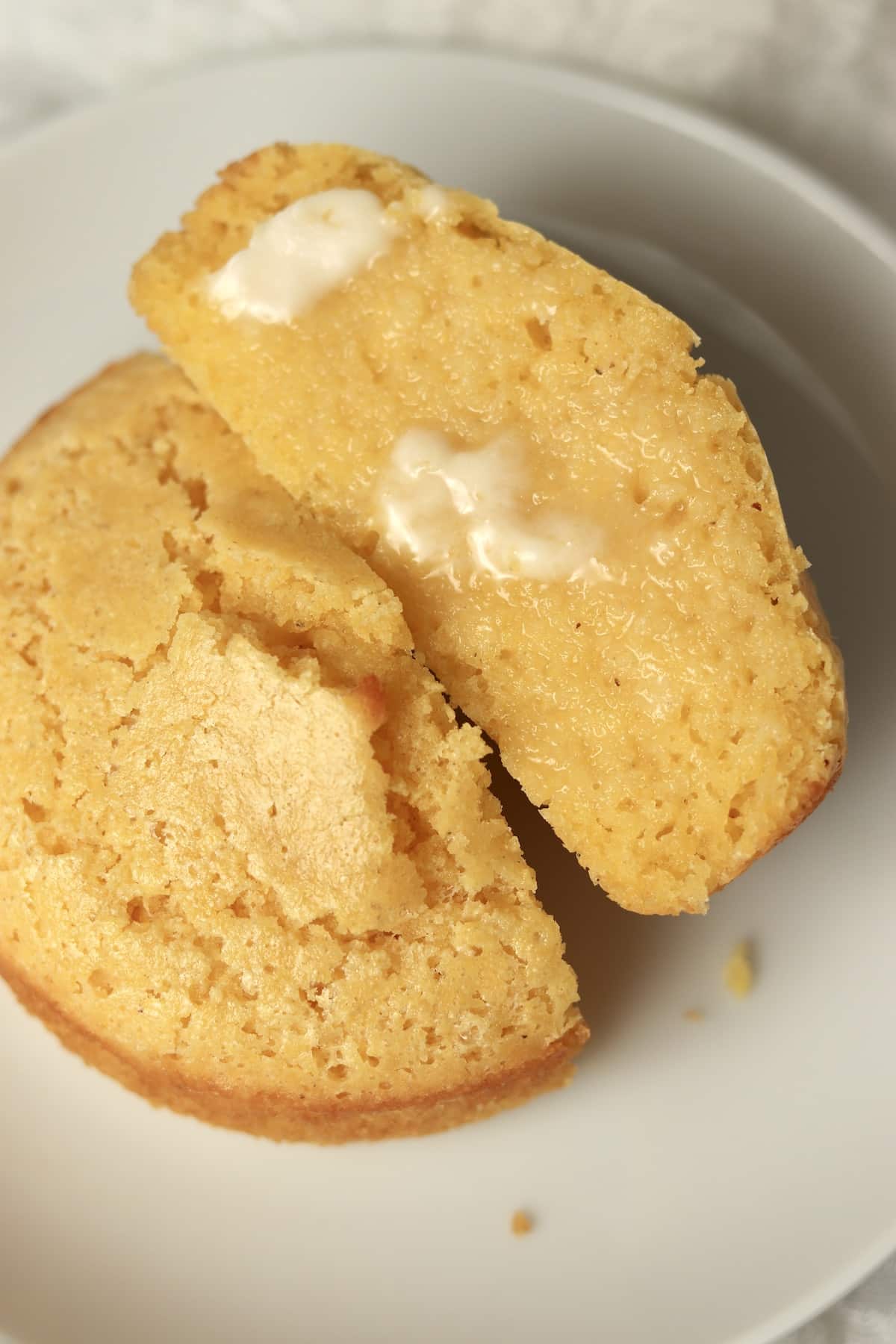 Cornbread for one cut in half and buttered.