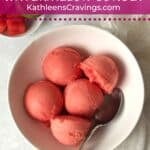 Scoops of watermelon sorbet in a bowl.