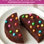 Single serve cosmic brownie cut in half on a plate.