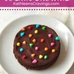 A small cosmic brownie with rainbow coated chips.