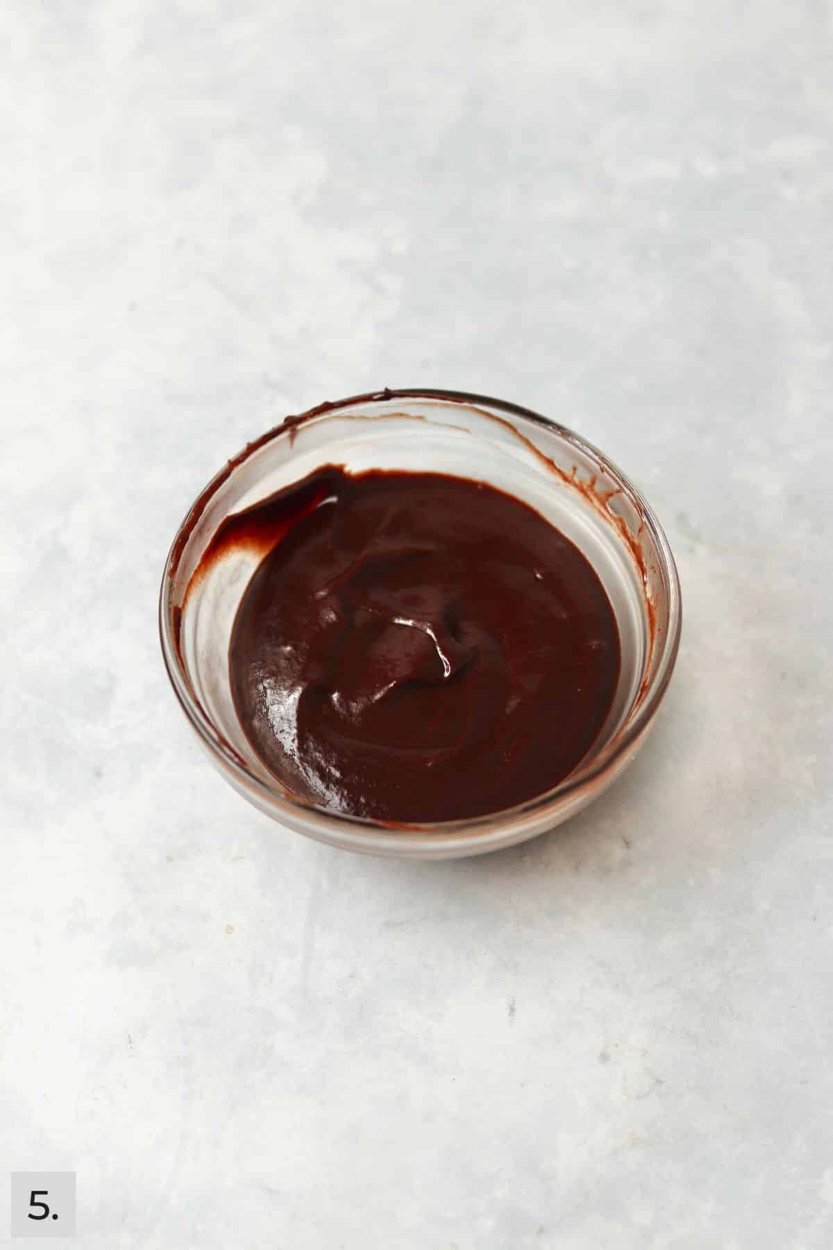 Ganache in a small glass bowl.