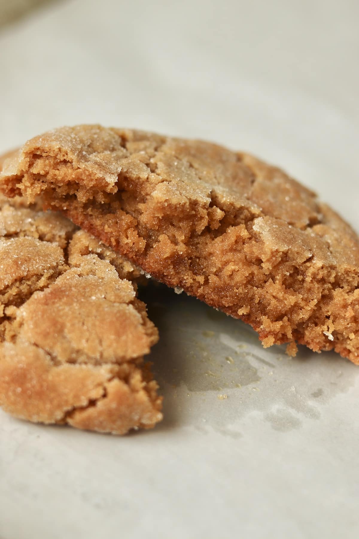 Single serve peanut butter cookie broken in half.