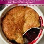 A single serve blackberry cobbler baked in a ramekin.