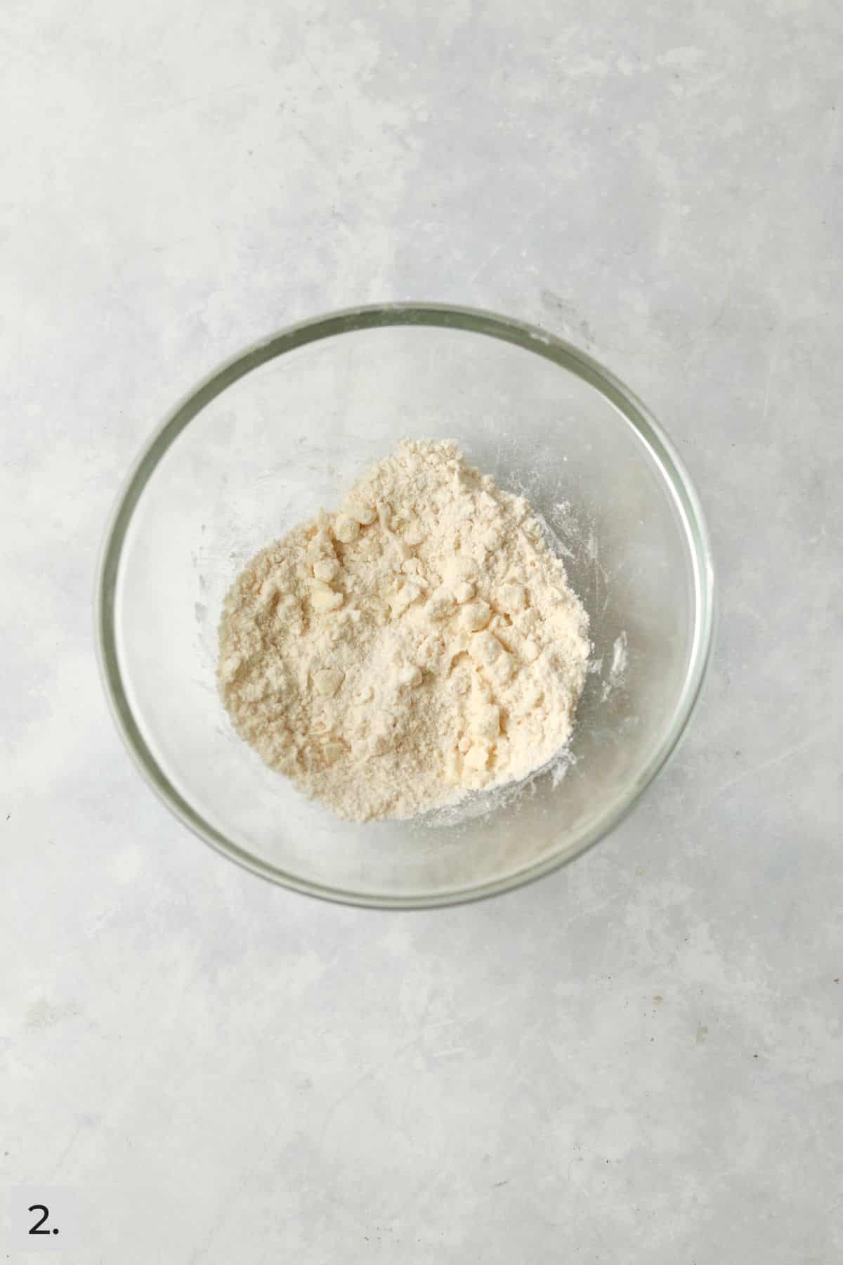 Butter cut into flour in a small bowl.