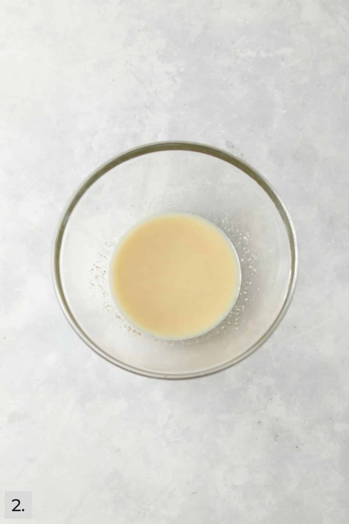 Yeast mixed into warmed milk and butter.