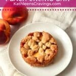 Single serve peach crumb bar on a plate.