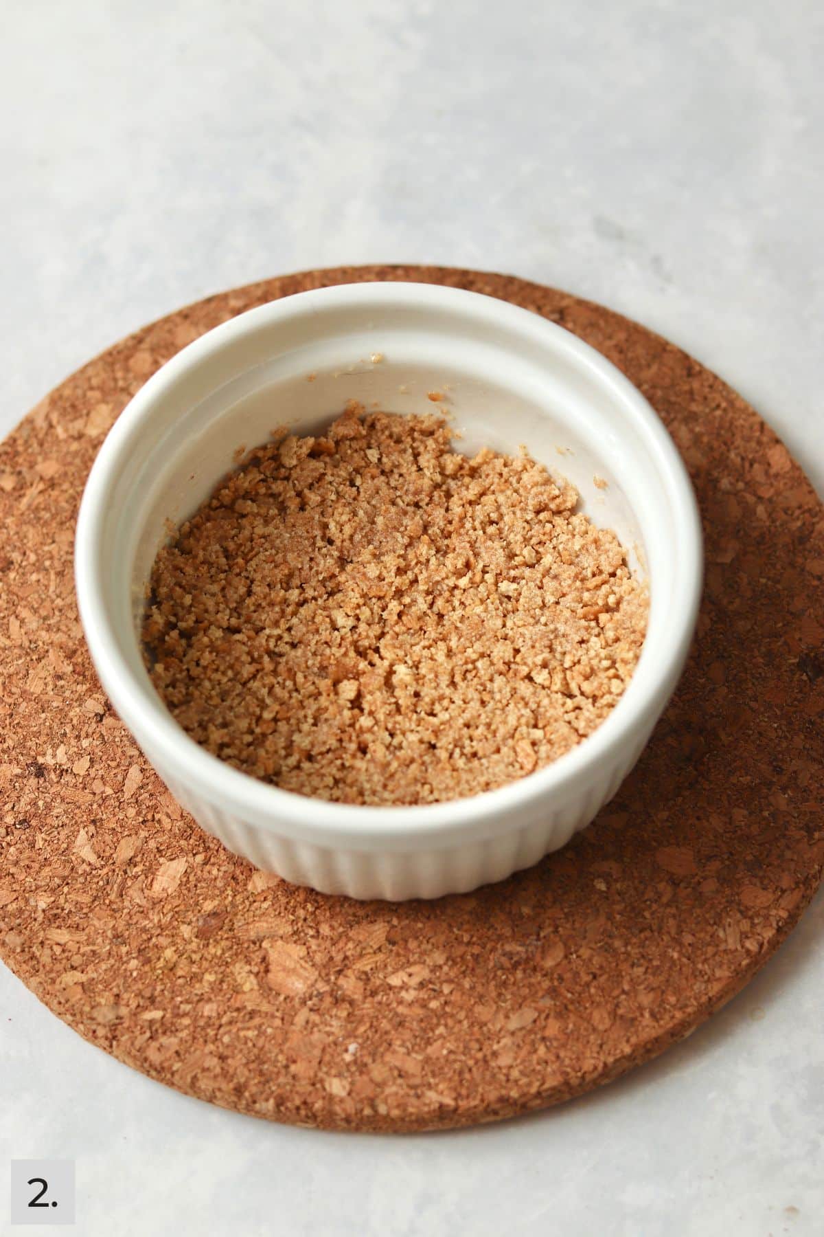 Graham cracker crust baked in a ramekin.