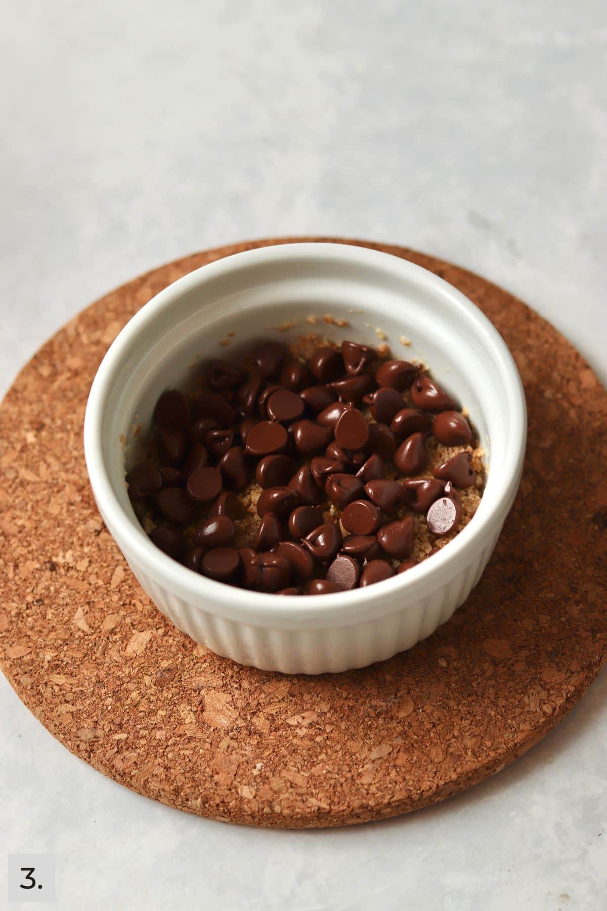 Chocolate chips on a graham cracker crust.