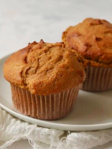 Single serve pumpkin muffin on a plate.
