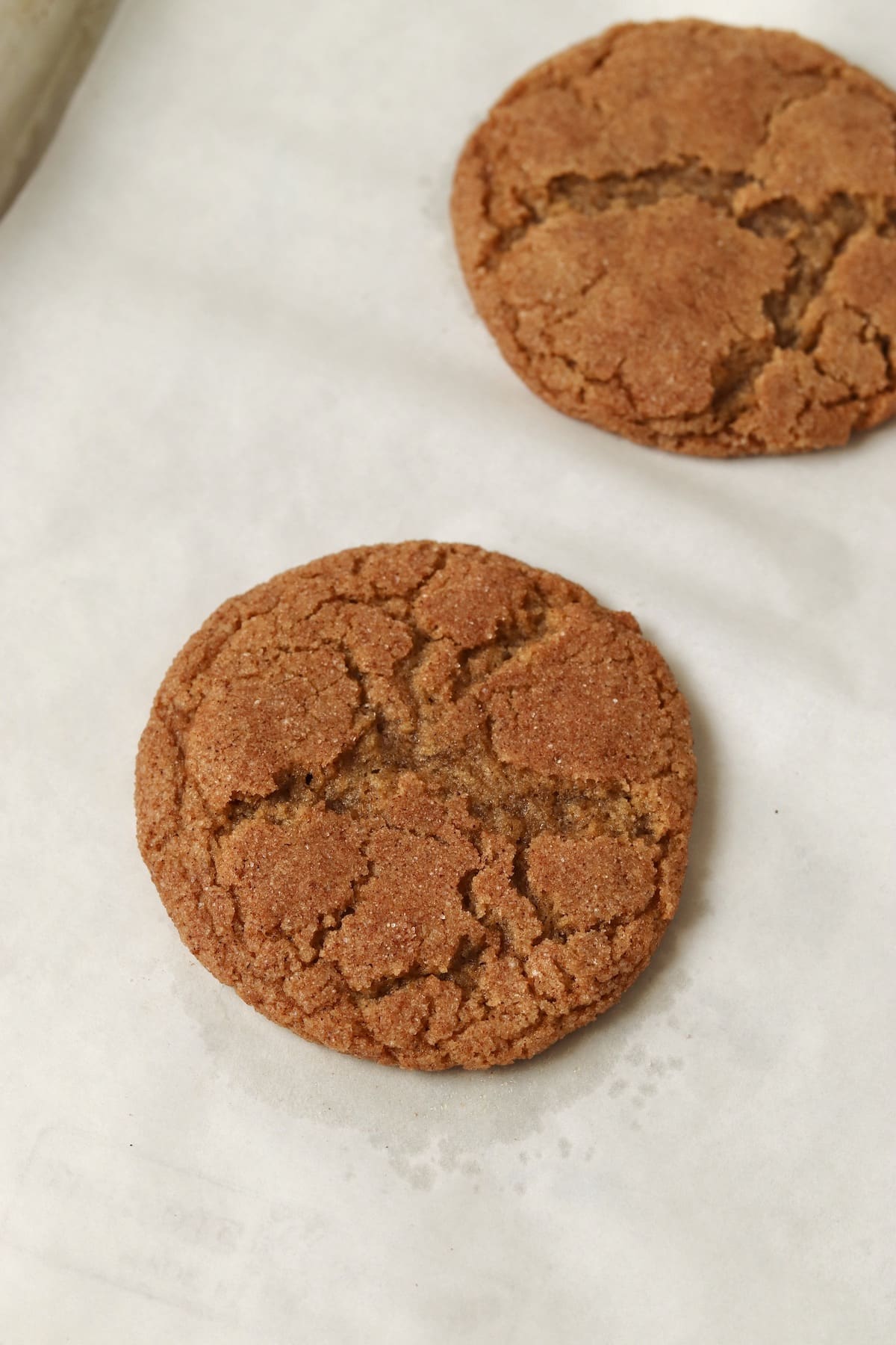 Single serve pumpkin snickerdoodle on a baking sheet.