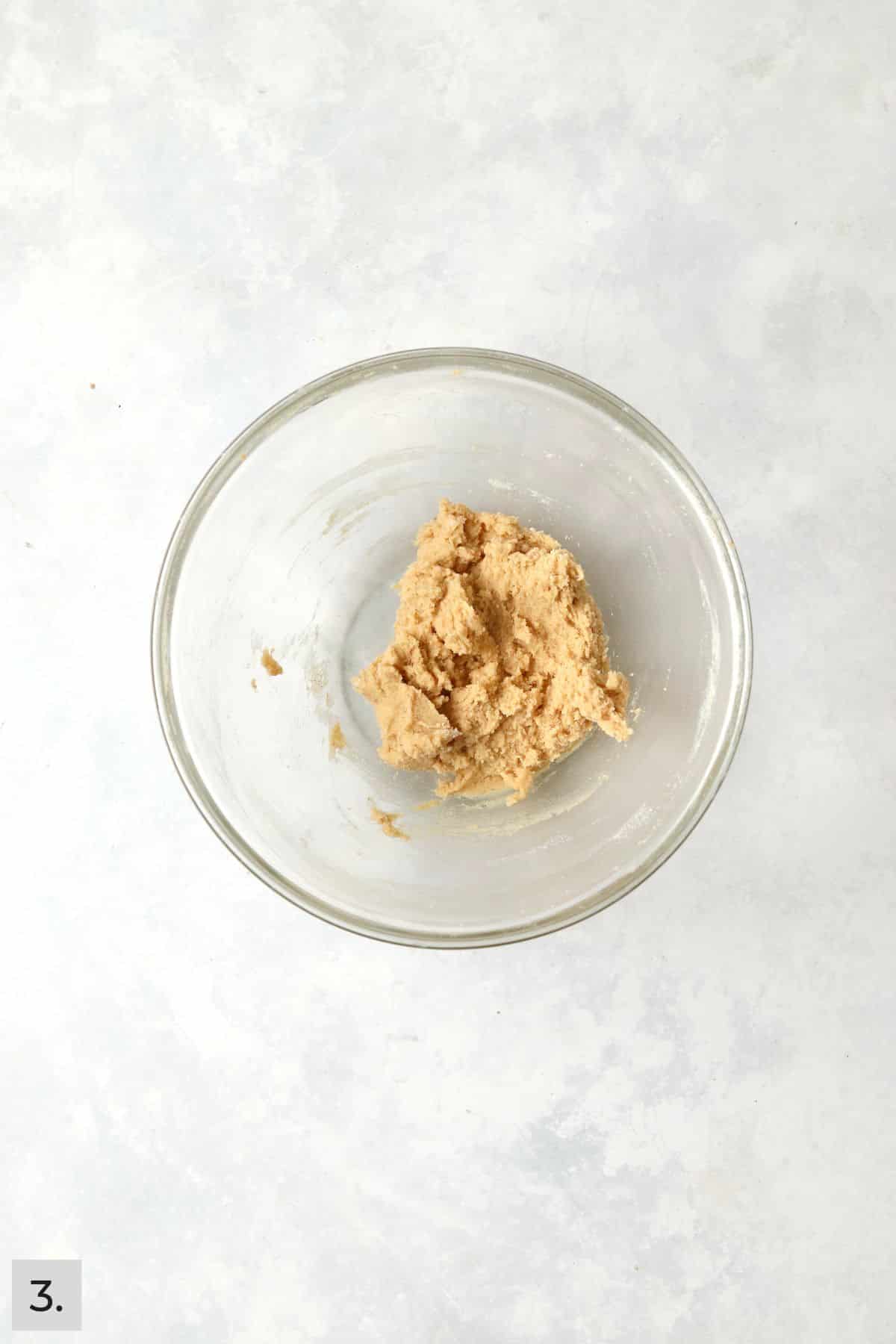 Chai spiced cookie dough in a mixing bowl.