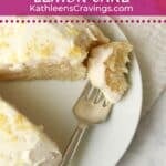 Single serve lemon cake with a fork on a plate.