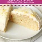 Frosted single serve lemon cake cut in half.