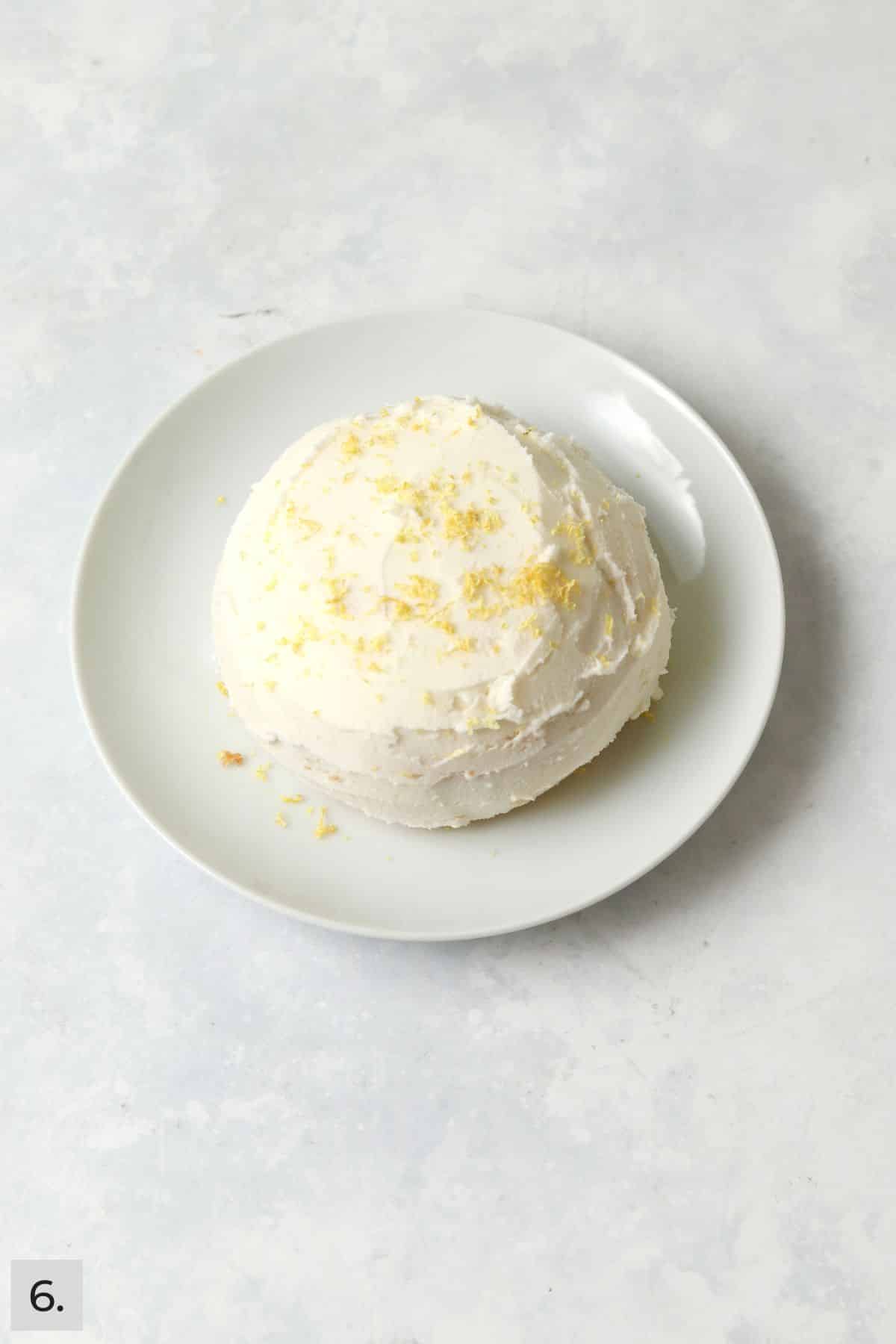 Single serve lemon cake with lemon cream cheese frosting.