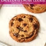 Baked single serve pistachio chocolate chunk cookies on a baking sheet.